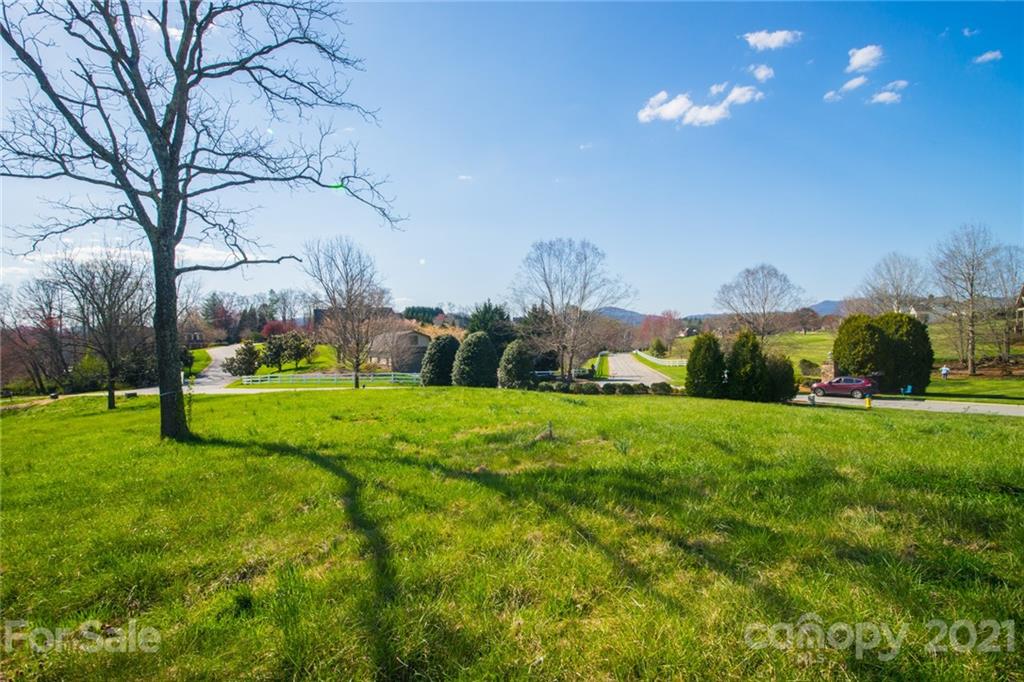 3 Waterhill Way Fletcher, NC 28732 - Photo 1 of 26 a view of a golf course with a house