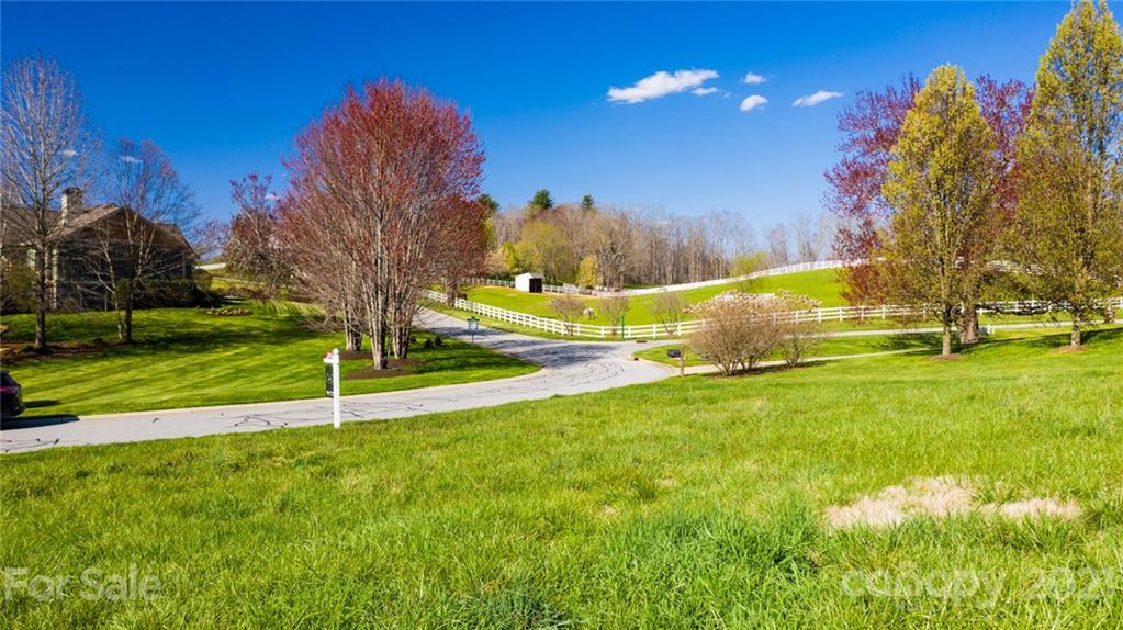 3 Waterhill Way Fletcher, NC 28732 - Photo 2 of 26 a view of a golf course with a house