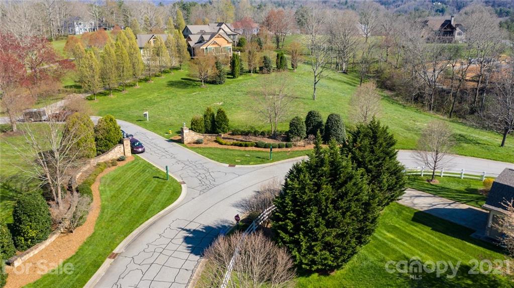 3 Waterhill Way Fletcher, NC 28732 - Photo 24 of 26 an aerial view of a house with a yard and lake view