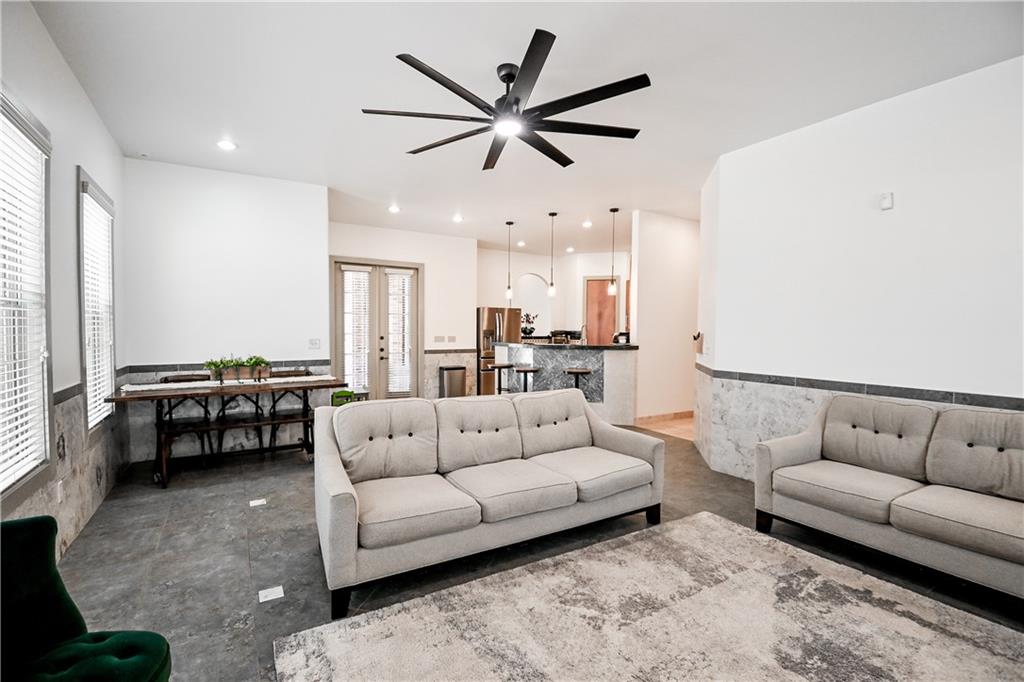 412 Trillium Trail Pendergrass, GA 30567 - Photo 17 of 49 a living room with furniture and kitchen view