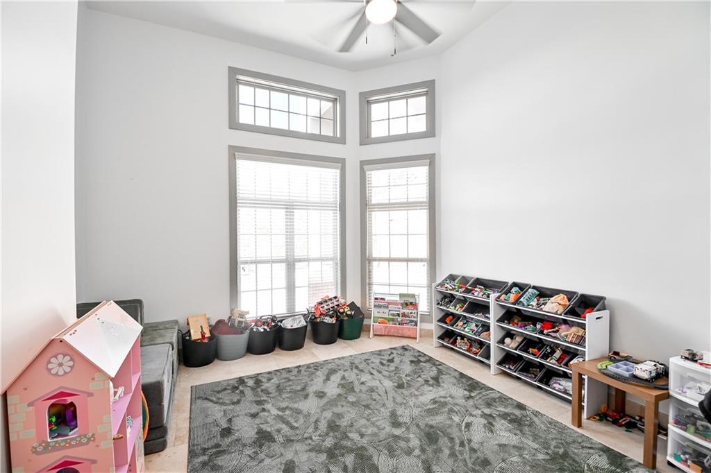 412 Trillium Trail Pendergrass, GA 30567 - Photo 17 of 37 a bedroom with furniture a bed and a window