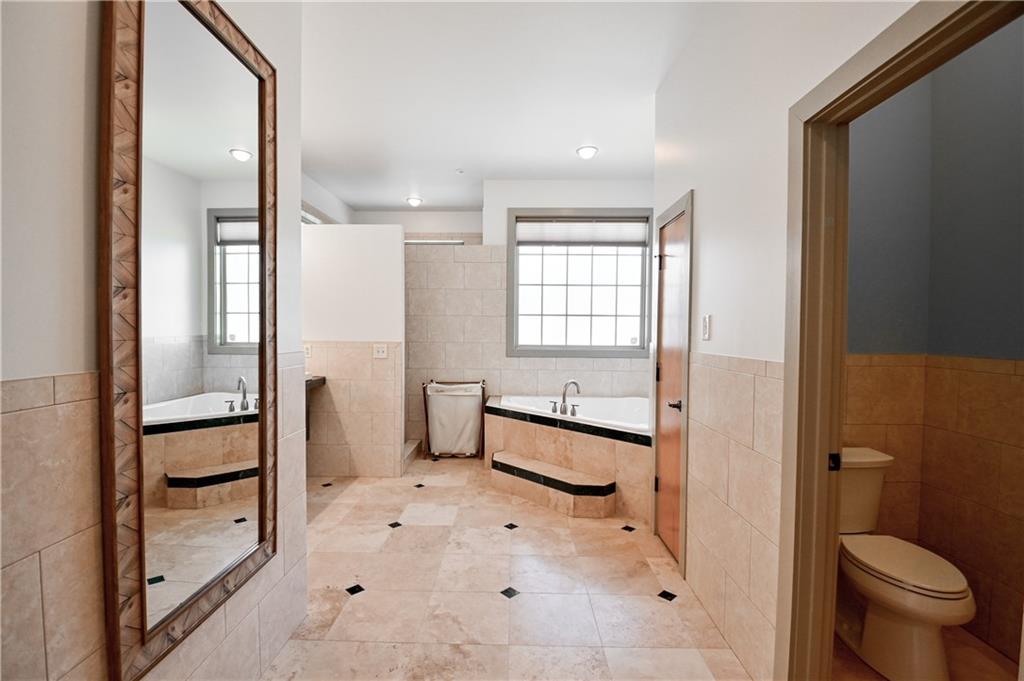 412 Trillium Trail Pendergrass, GA 30567 - Photo 19 of 37 a bathroom with a toilet sink and a mirror
