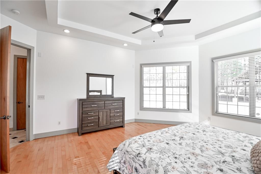 412 Trillium Trail Pendergrass, GA 30567 - Photo 20 of 37 a bedroom with a bed and a window