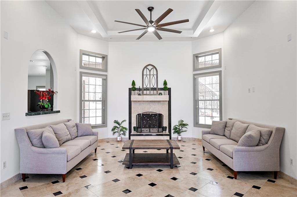 412 Trillium Trail Pendergrass, GA 30567 - Photo 6 of 49 a living room with furniture and a fireplace