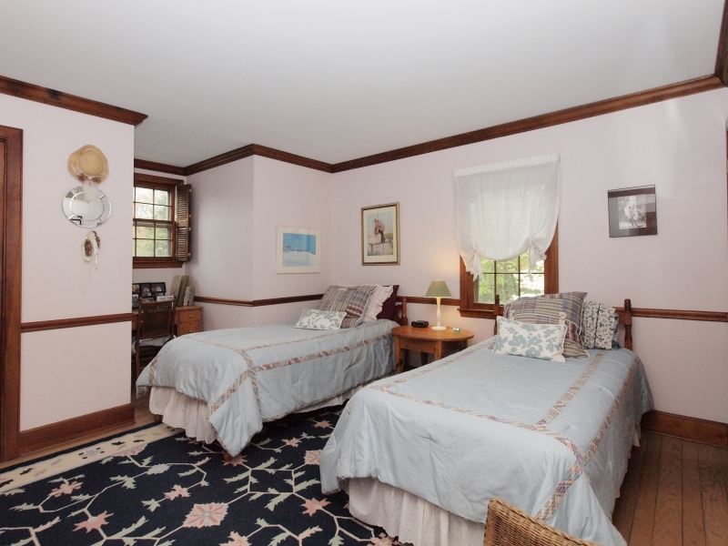 772 Ponus Ridge Road New Canaan, CT 06840 - Photo 15 of 19 a bedroom with double bed and a window