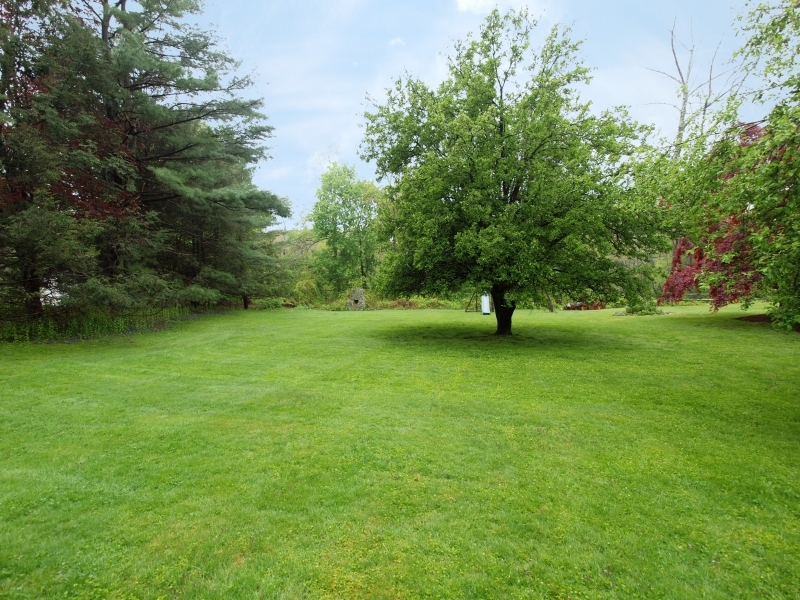 772 Ponus Ridge Road New Canaan, CT 06840 - Photo 19 of 19 a view of outdoor space with deck and yard
