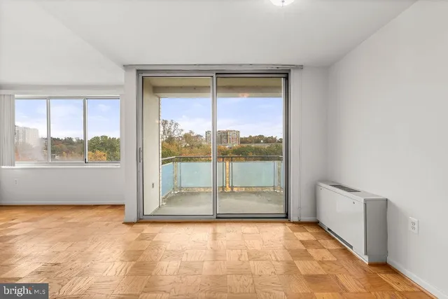 a view of an empty room and window