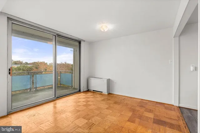 a view of an empty room and window