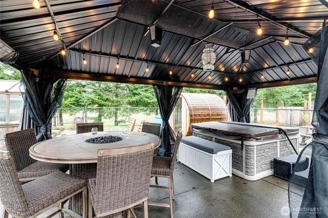 a dining room with furniture window and outside view