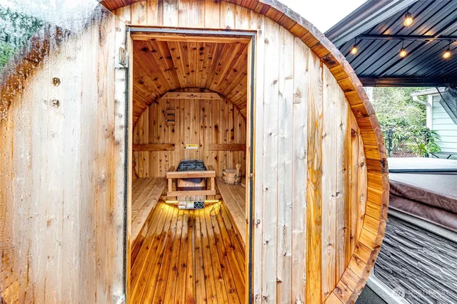 a view of a door with wooden floor