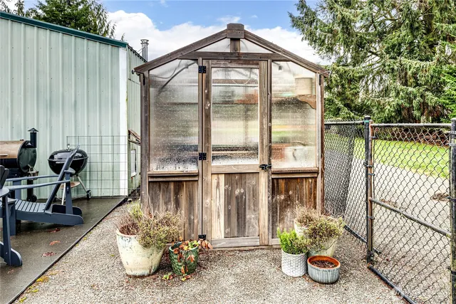 a front view of a house having patio