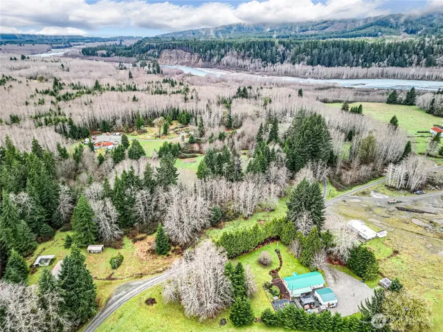 an aerial view of a yard with horses
