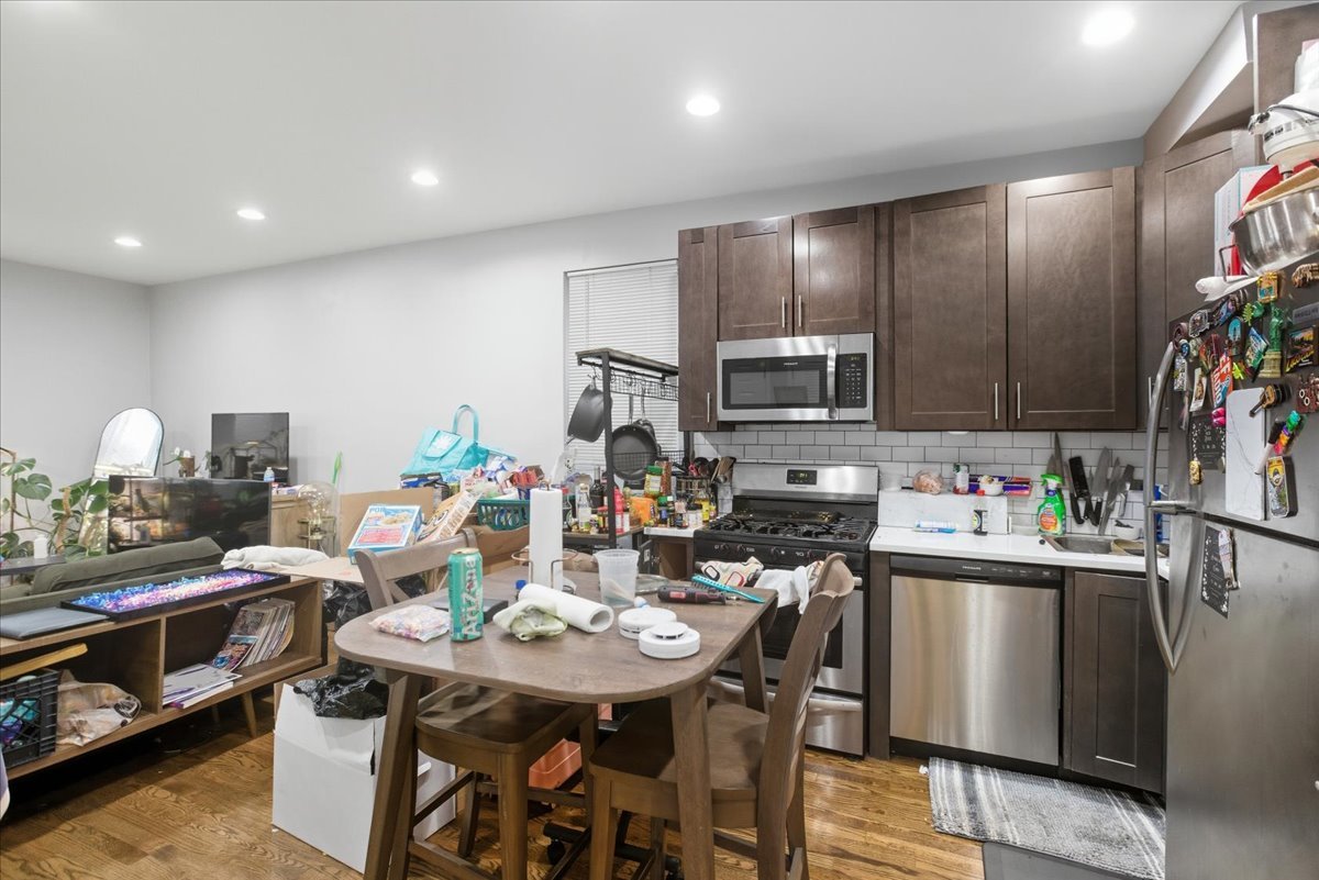 518 North May Street, Unit 1 Chicago, IL 60642 - Photo 5 of 10 a view of a dining room with furniture