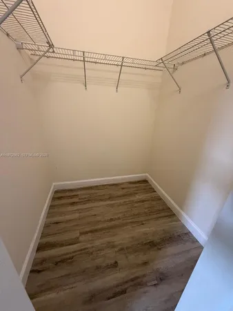 a view of a room with racks on the wall
