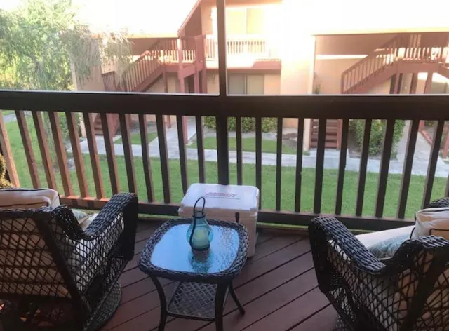 a kitchen with a stove and a refrigerator