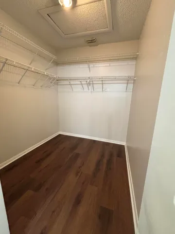 a bathroom with a toilet and shower