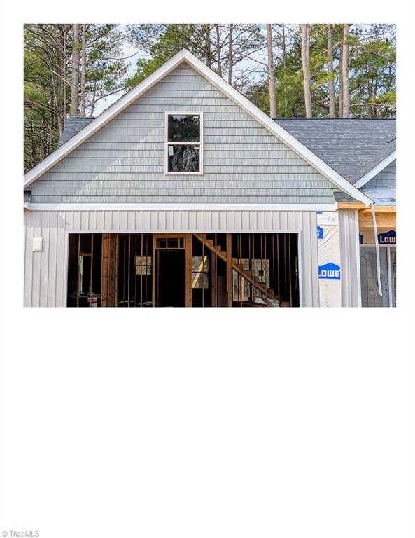 130 Fox Run Eden, NC 27288 - Photo 2 of 4 Area above garage with shingles installed