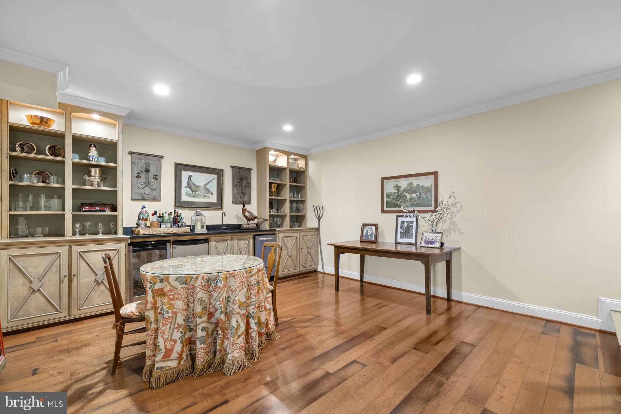36190 Turkey Roost Road Middleburg, VA 20117 - Photo 70 of 88 a living room with furniture a window and wooden floor