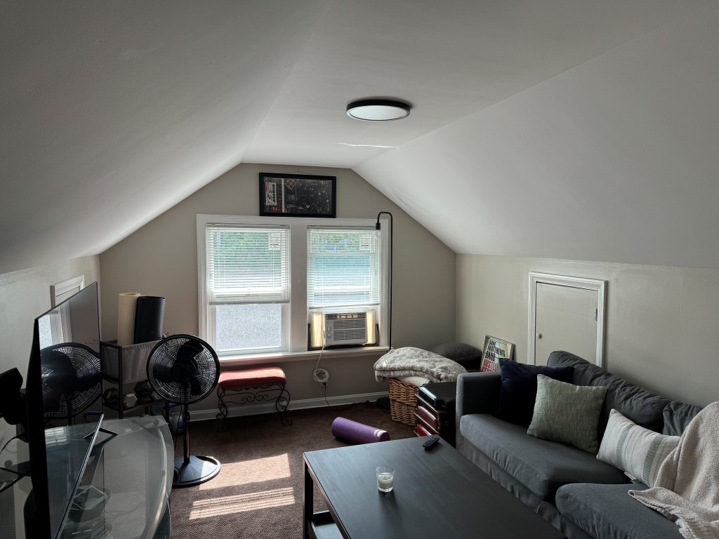 3218 Oak Avenue, Unit 3 Brookfield, IL 60513 - Photo 6 of 8 a living room with furniture a couch and windows