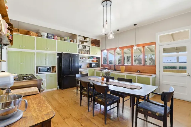 a outdoor dining space with furniture and outdoor view