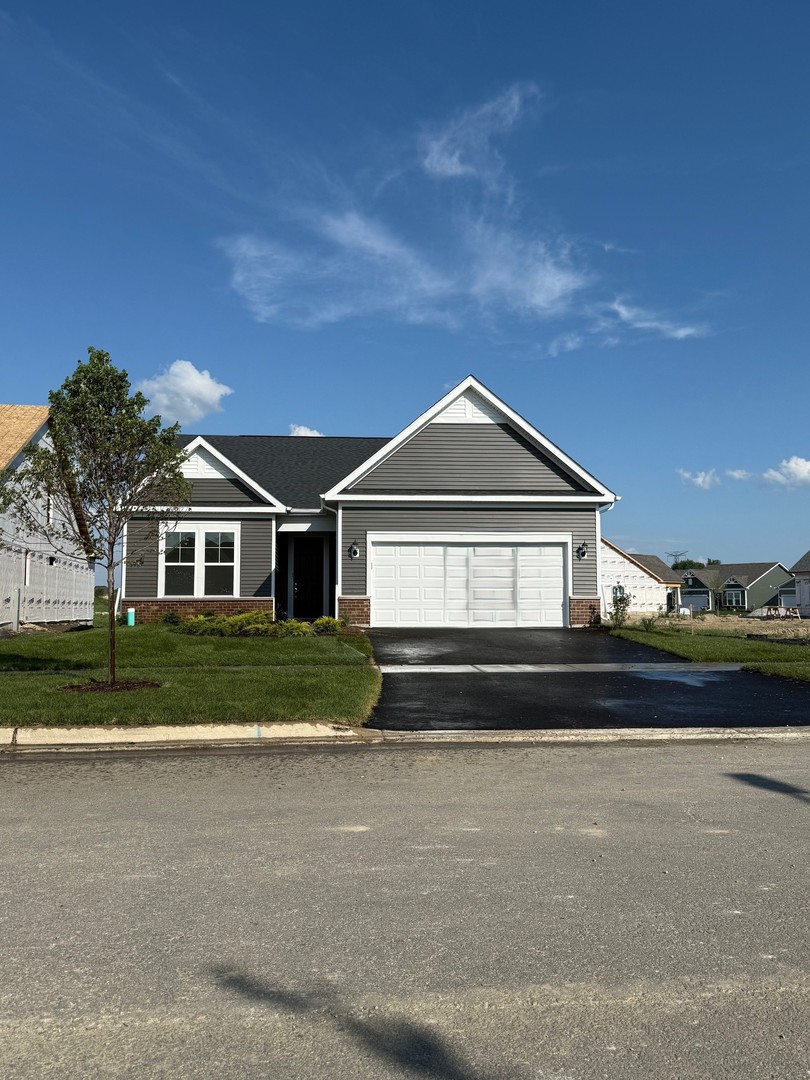 3126 Timberlake Avenue New Lenox, IL 60451 - Photo 1 of 1 a front view of a house with a yard