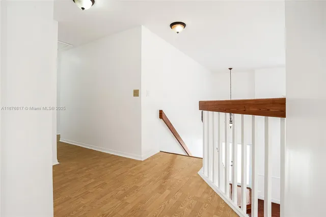 a view of a livingroom with wooden floor