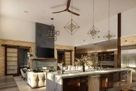 a kitchen with a stove and cabinets