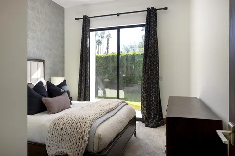 a outdoor space with lots of white furniture
