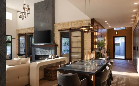 a kitchen with a counter top space a sink appliances and cabinets