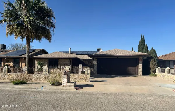 a front view of a house with swimming pool