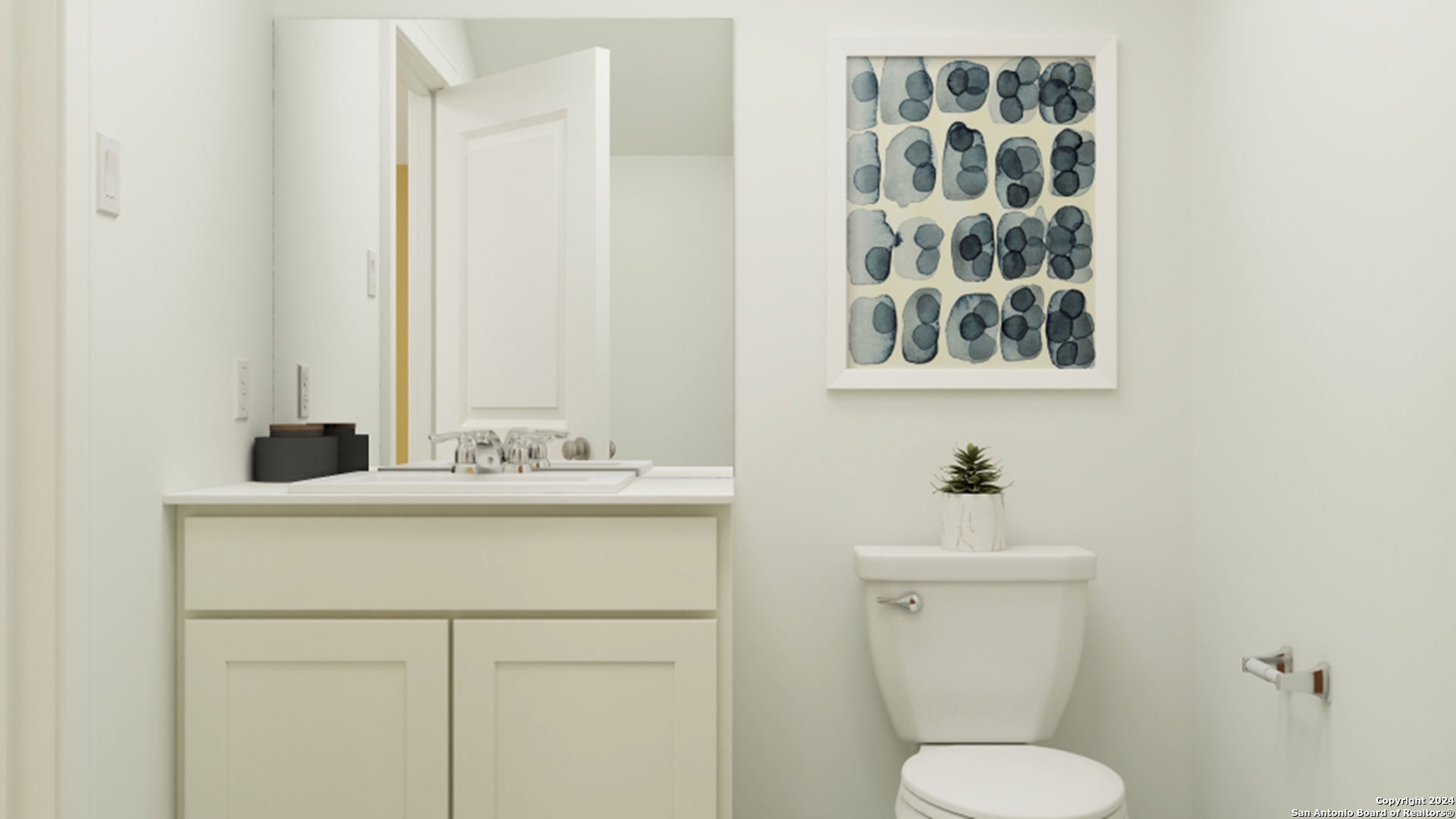 5010 Primrose Ridge Converse, TX 78109 - Photo 8 of 17 a bathroom with a toilet sink and mirror