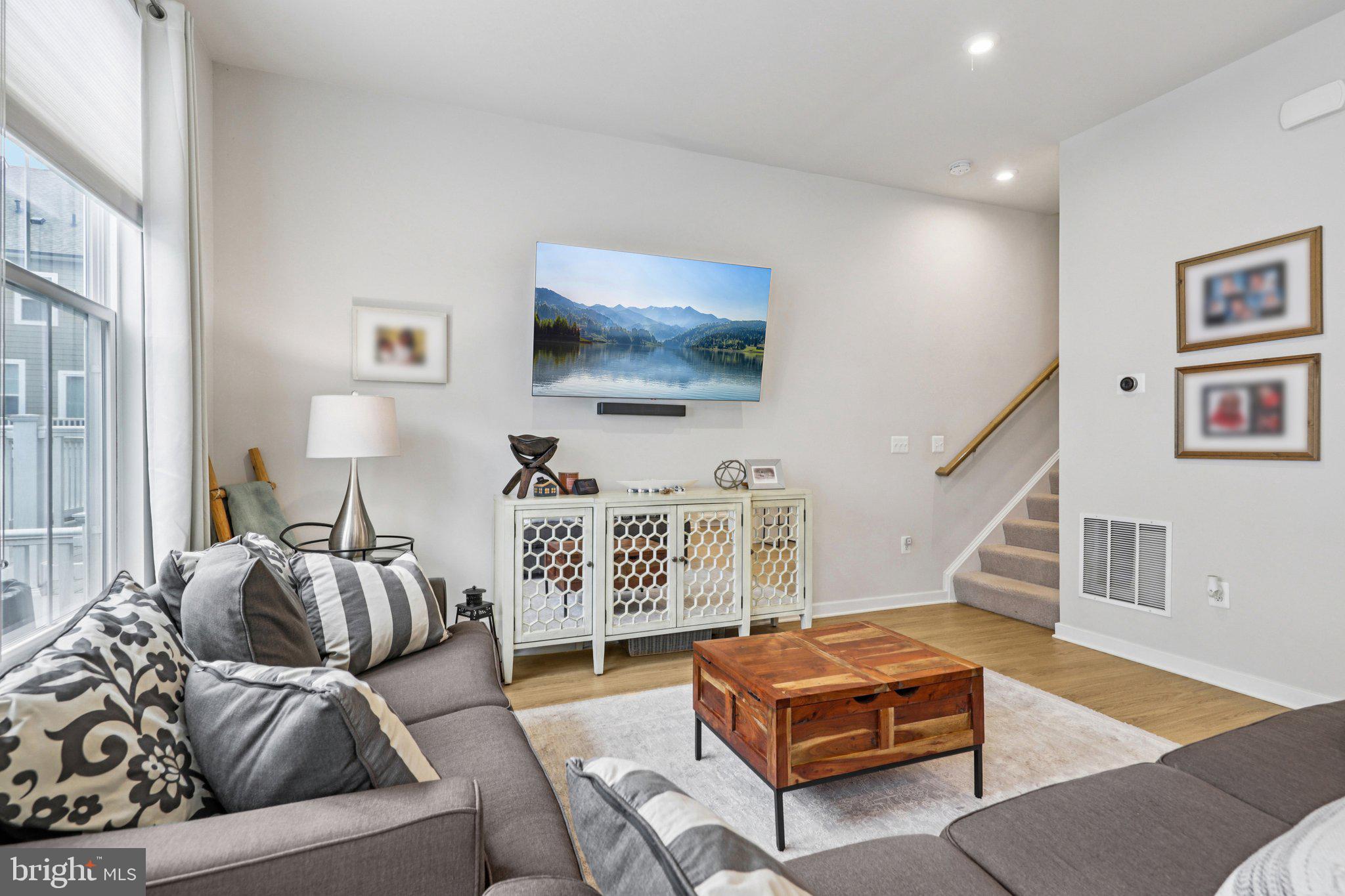 1687 Aspen Poplar Road Dumfries, VA 22026 - Photo 18 of 69 a living room with furniture and a flat screen tv