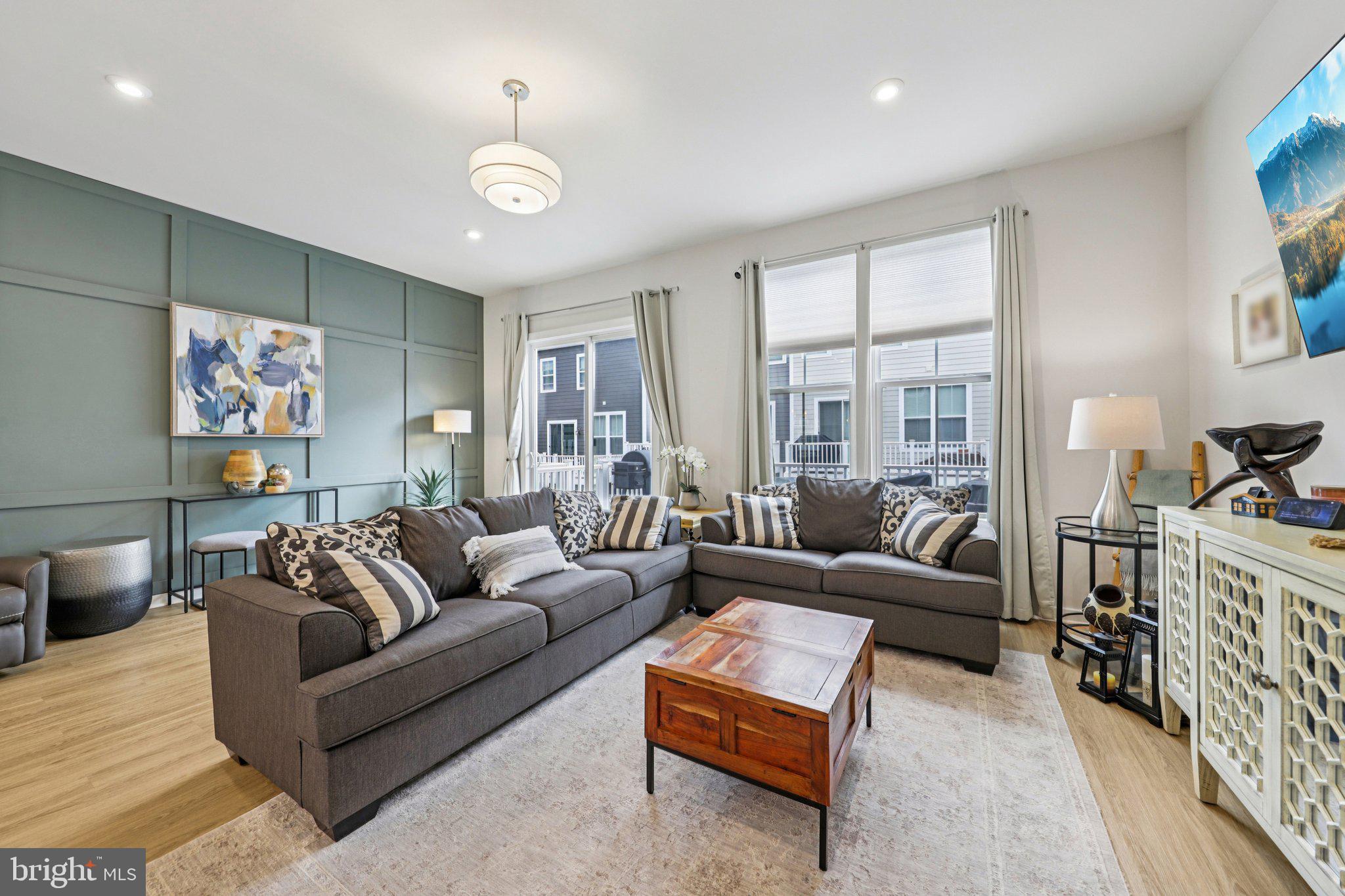 1687 Aspen Poplar Road Dumfries, VA 22026 - Photo 19 of 69 a living room with furniture and a large window