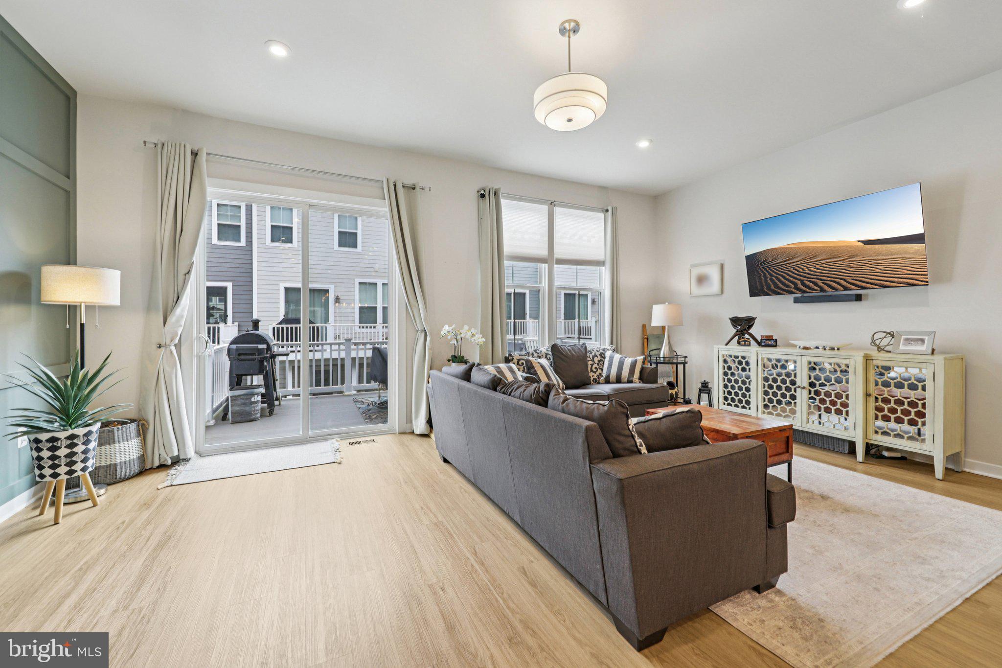 1687 Aspen Poplar Road Dumfries, VA 22026 - Photo 20 of 69 a living room with furniture and a flat screen tv