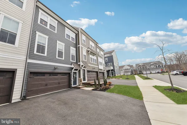 a view of a street with buildings in the background