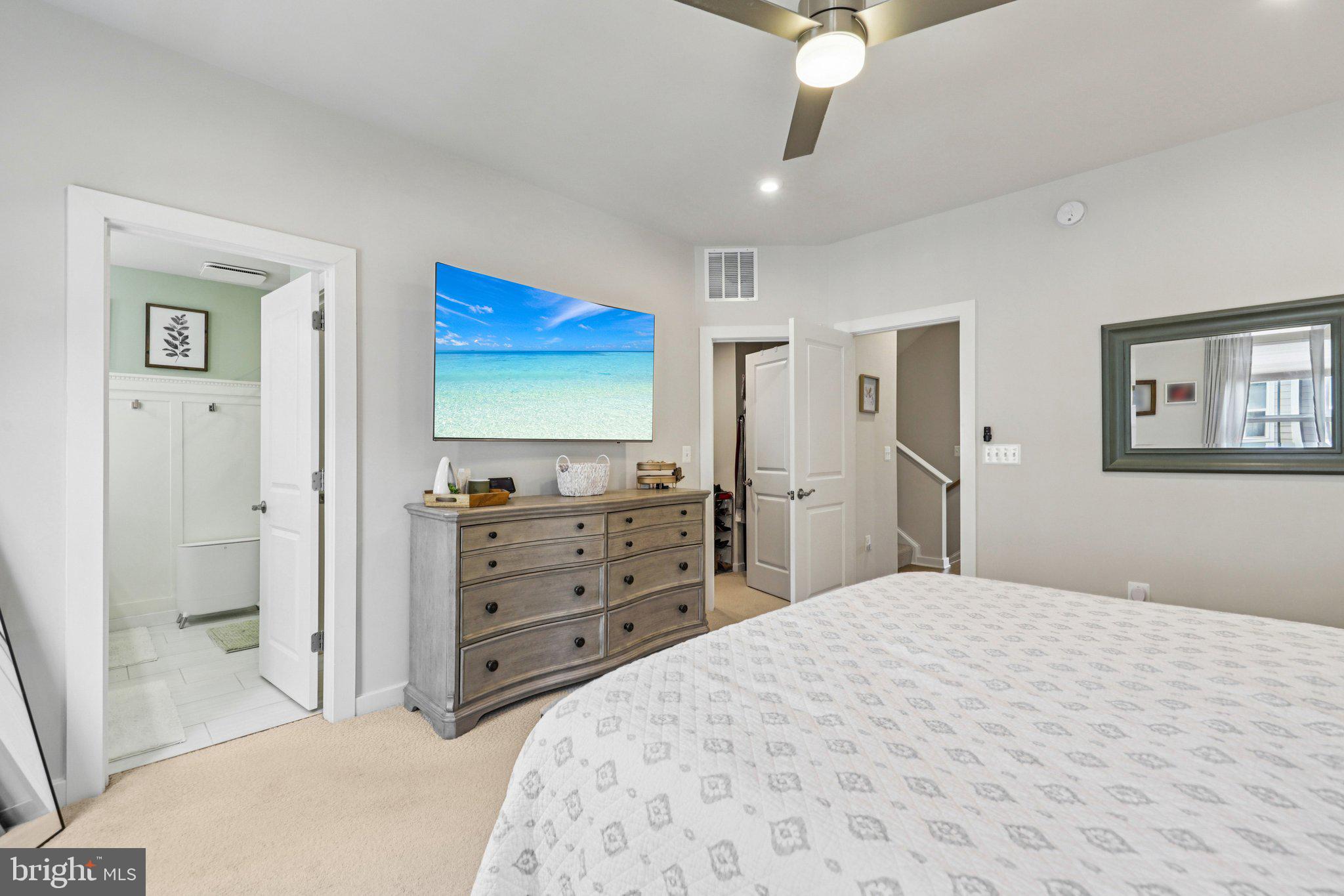 1687 Aspen Poplar Road Dumfries, VA 22026 - Photo 25 of 69 a bedroom with a bed and a chandelier