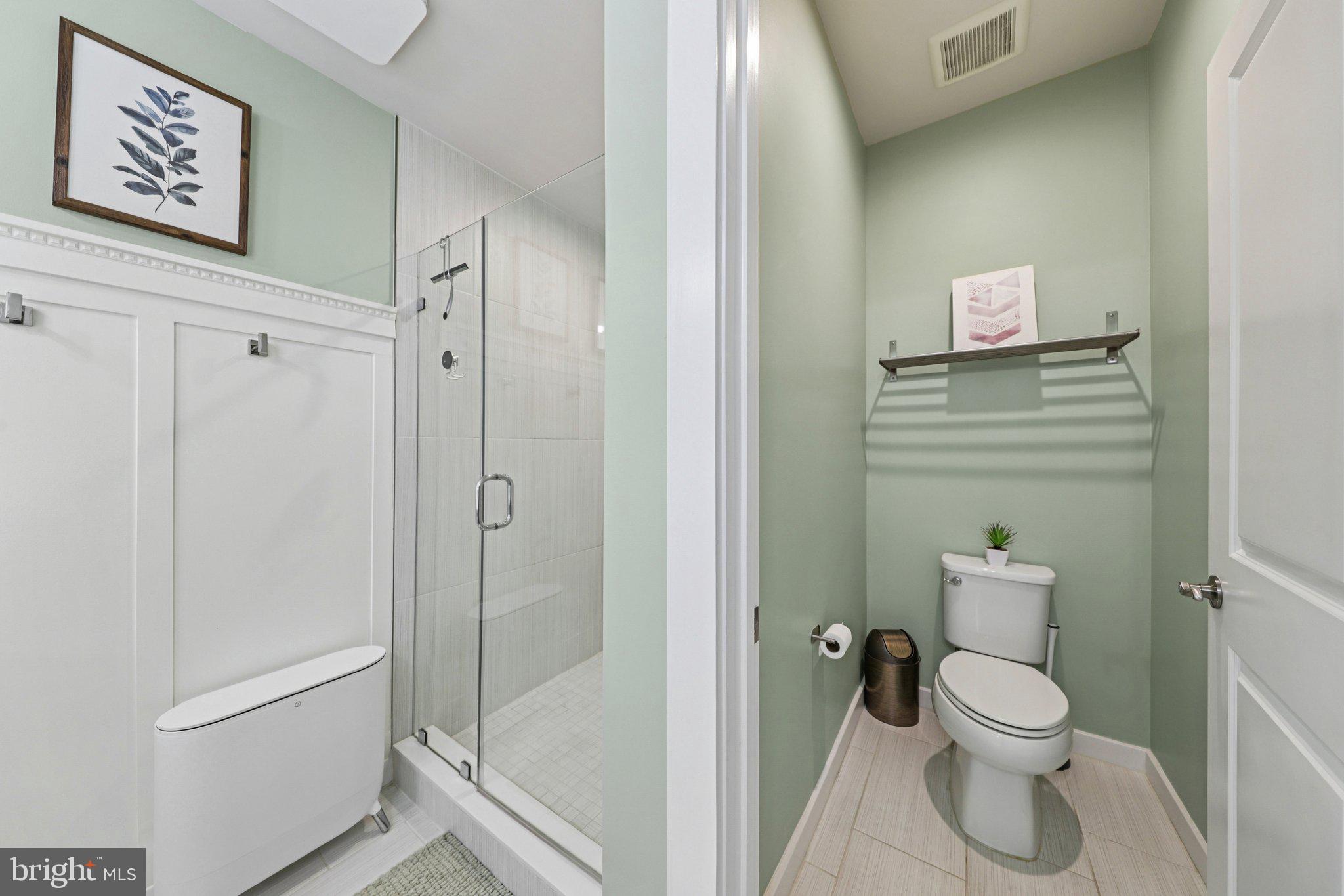 1687 Aspen Poplar Road Dumfries, VA 22026 - Photo 29 of 69 a bathroom with a toilet and a shower
