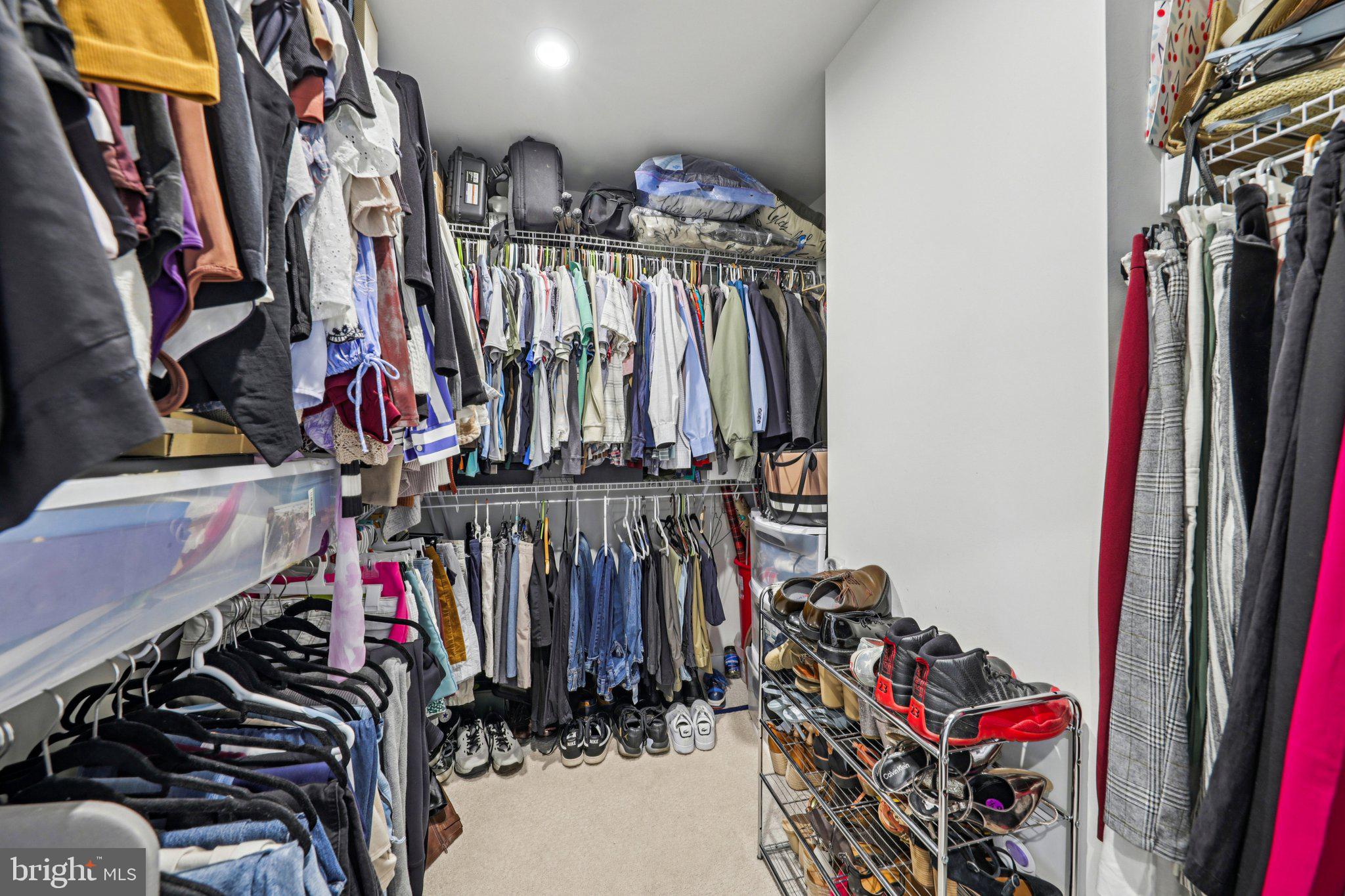 1687 Aspen Poplar Road Dumfries, VA 22026 - Photo 31 of 69 a view of walk in closet with clothes
