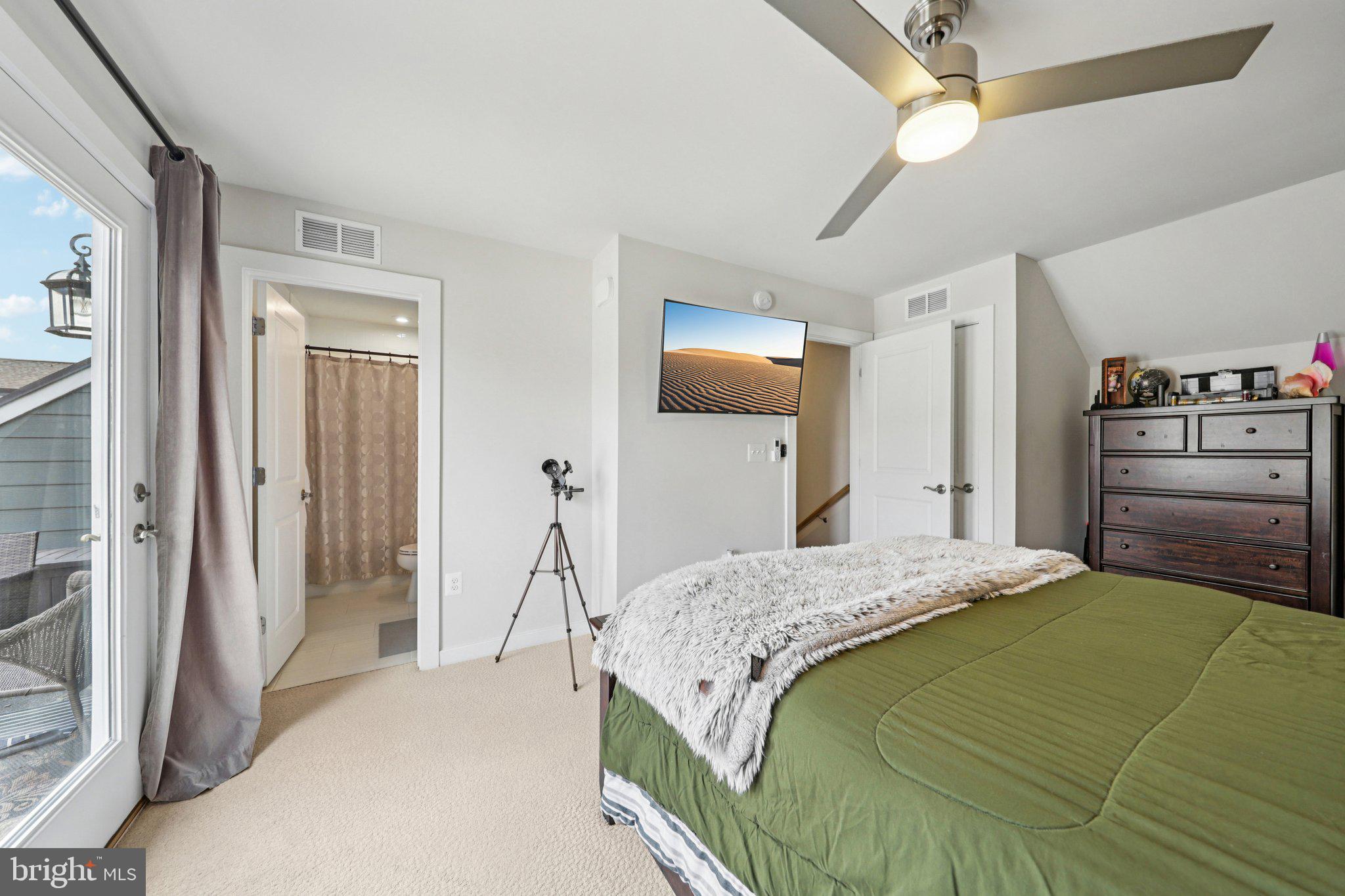 1687 Aspen Poplar Road Dumfries, VA 22026 - Photo 41 of 69 a bedroom with a bed and a mirror