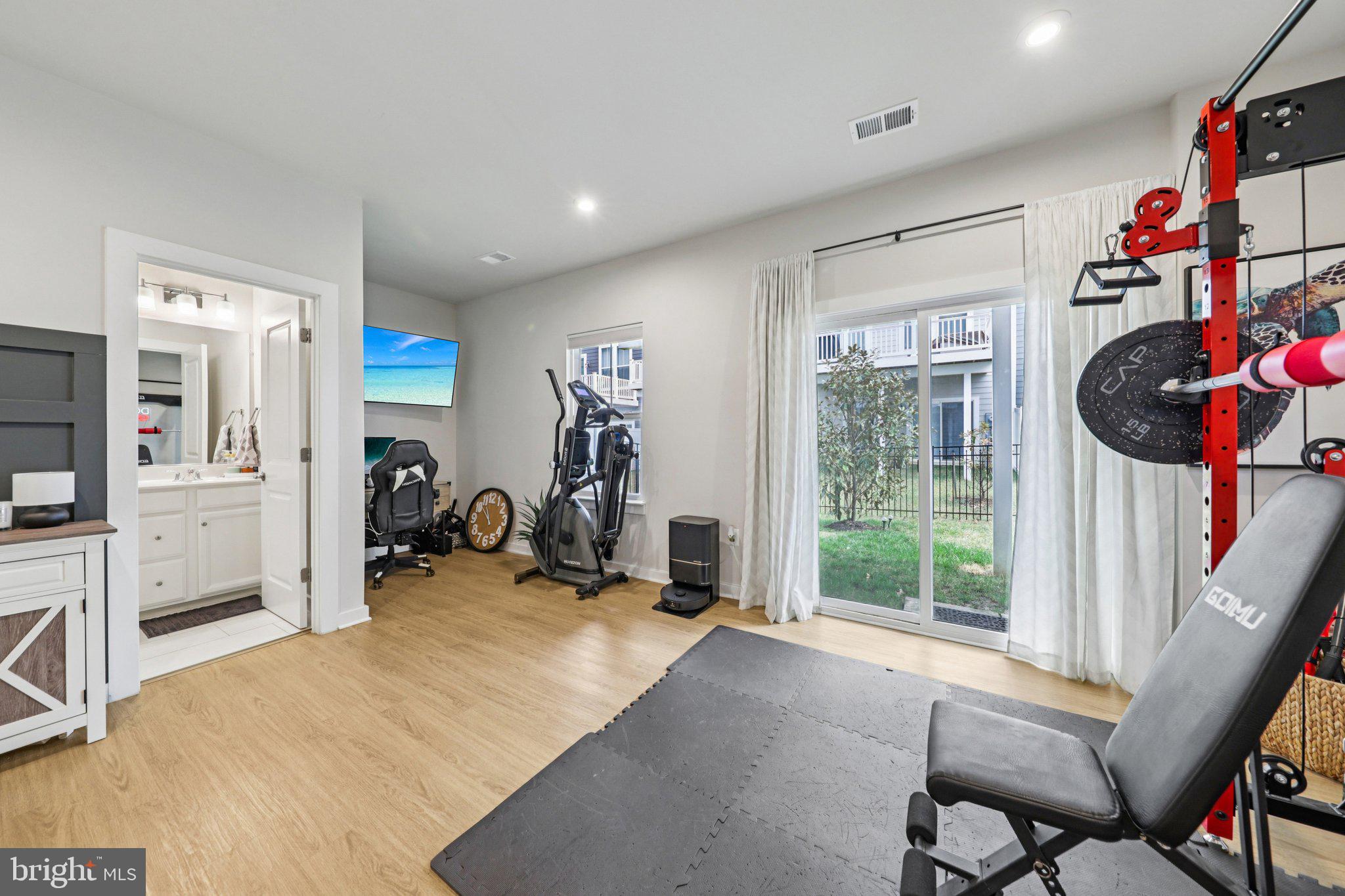 1687 Aspen Poplar Road Dumfries, VA 22026 - Photo 48 of 69 a view of a room with gym equipment