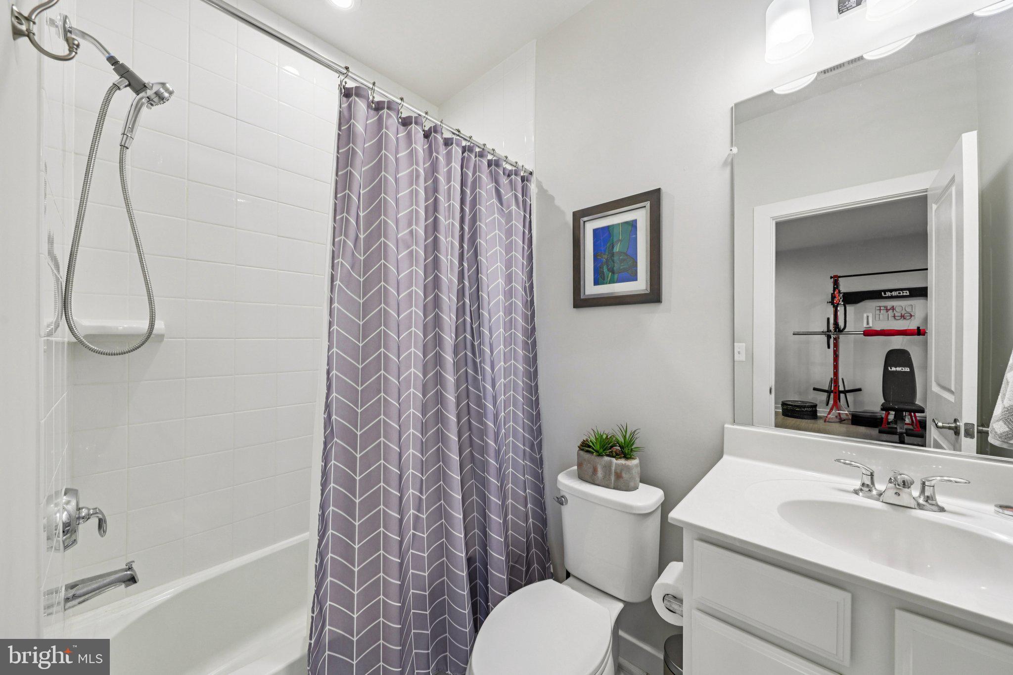 1687 Aspen Poplar Road Dumfries, VA 22026 - Photo 52 of 69 a bathroom with a sink toilet and shower
