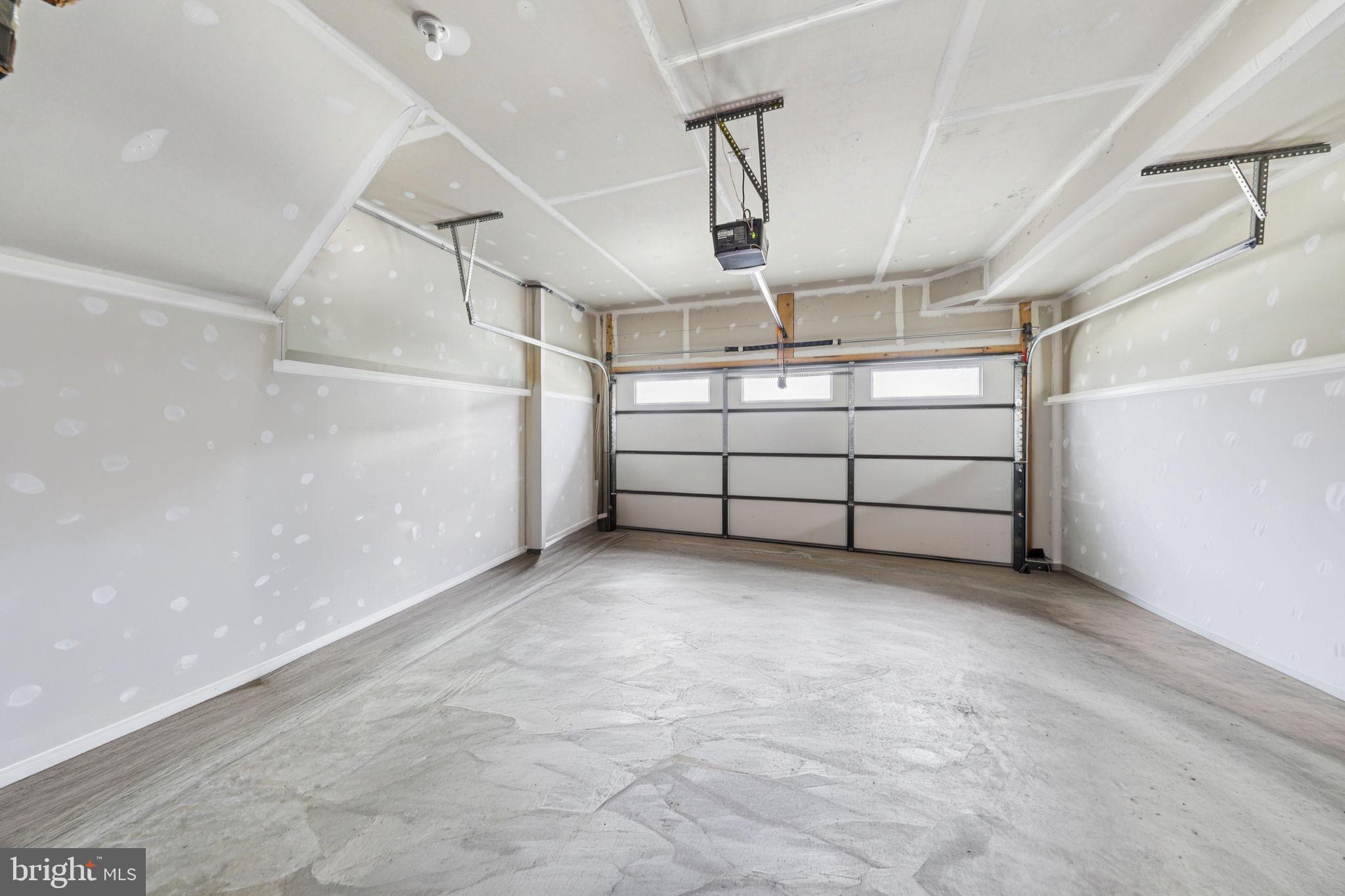 1687 Aspen Poplar Road Dumfries, VA 22026 - Photo 53 of 69 Two Car Garage includes EV Charger and Storage