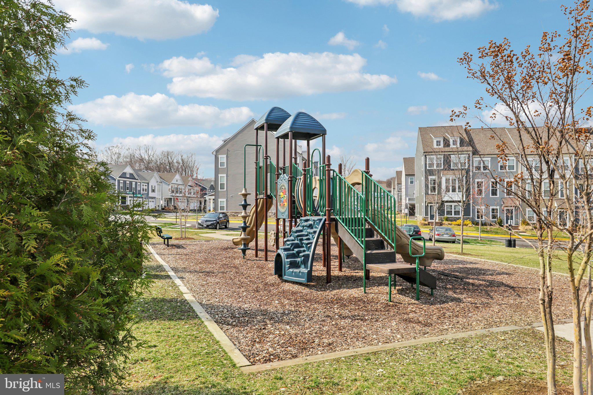 1687 Aspen Poplar Road Dumfries, VA 22026 - Photo 57 of 69 a view of a park with swings and slides