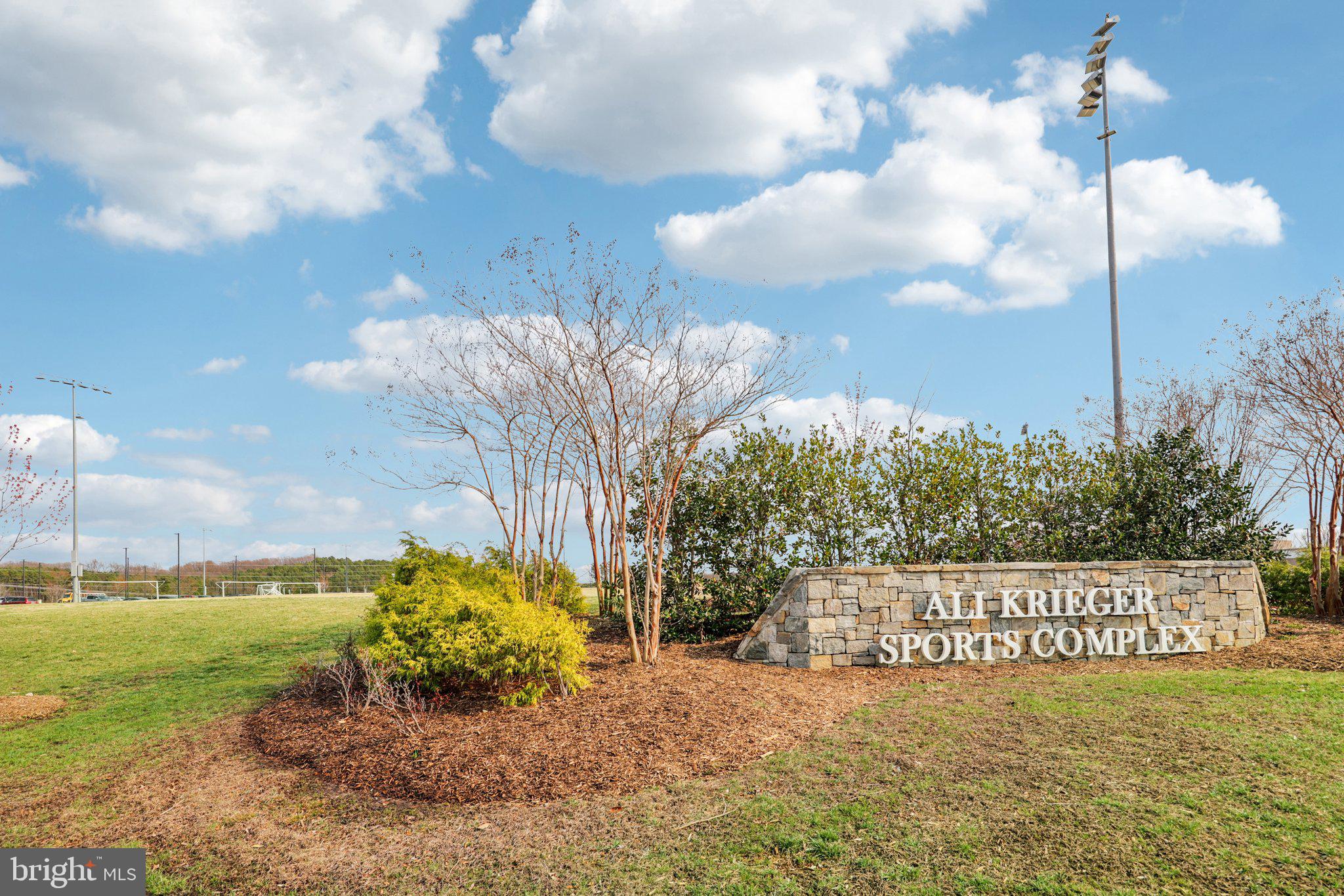 1687 Aspen Poplar Road Dumfries, VA 22026 - Photo 63 of 69 a view of a street with a building in the background
