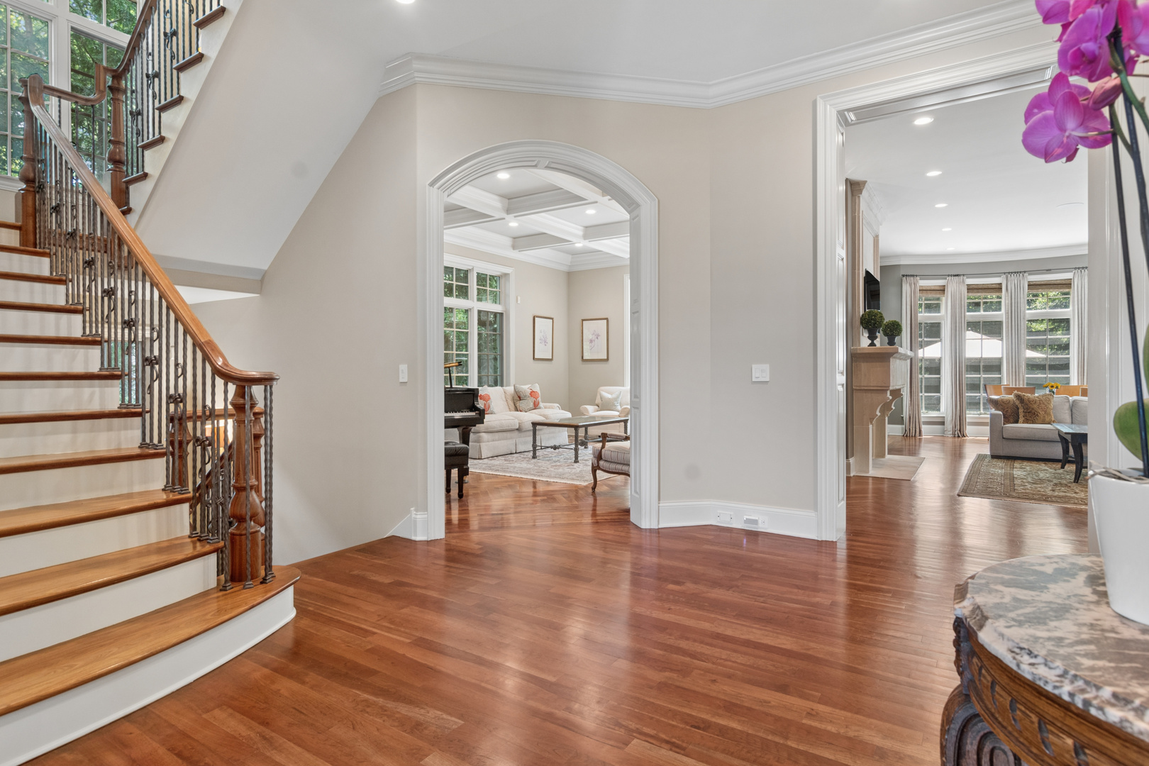 1128 Mt Pleasant Road Winnetka, IL 60093 - Photo 9 of 58 a view of a living room and dining room with wooden floor