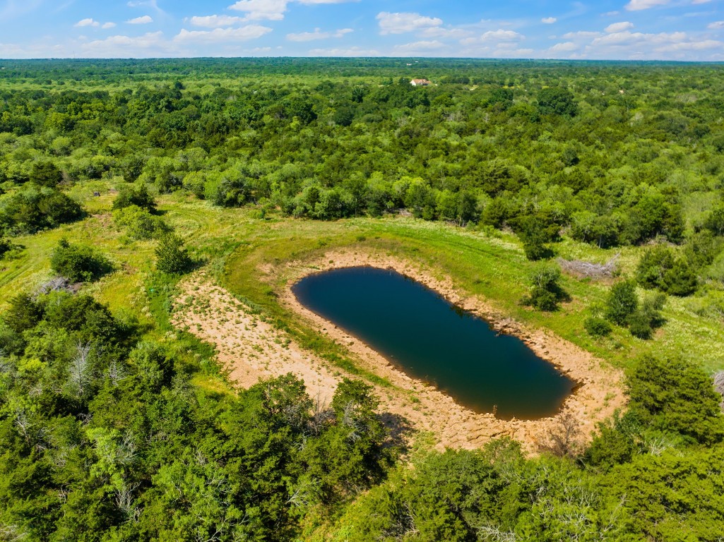 530 Chamberlin Road Dale, TX 78616 - Photo 3 of 10 a view of a back yard of a house