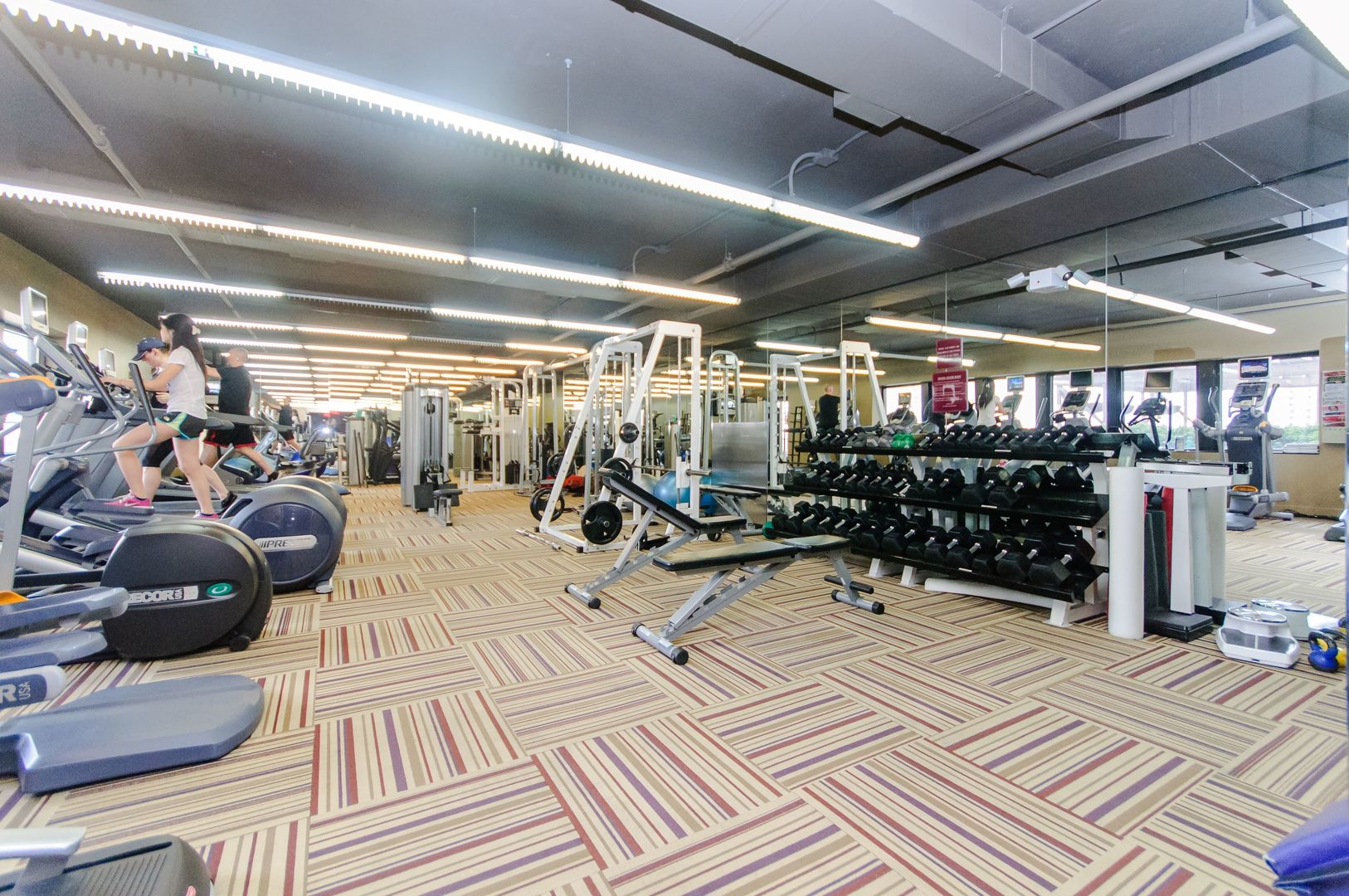 30 East Huron Street, Unit 3005 Chicago, IL 60611 - Photo 19 of 21 a view of a room with lots of gym equipment