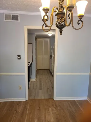 a view of entryway with wooden floor