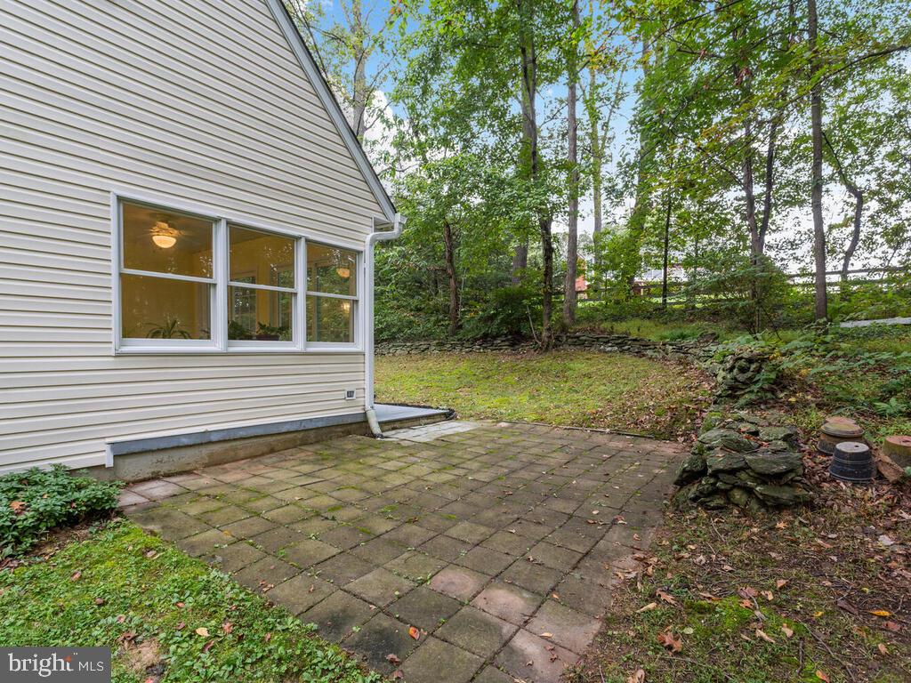 3619 Carrollton Road Upperco, MD 21155 - Photo 66 of 82 Brick paver patio outside the Sunroom