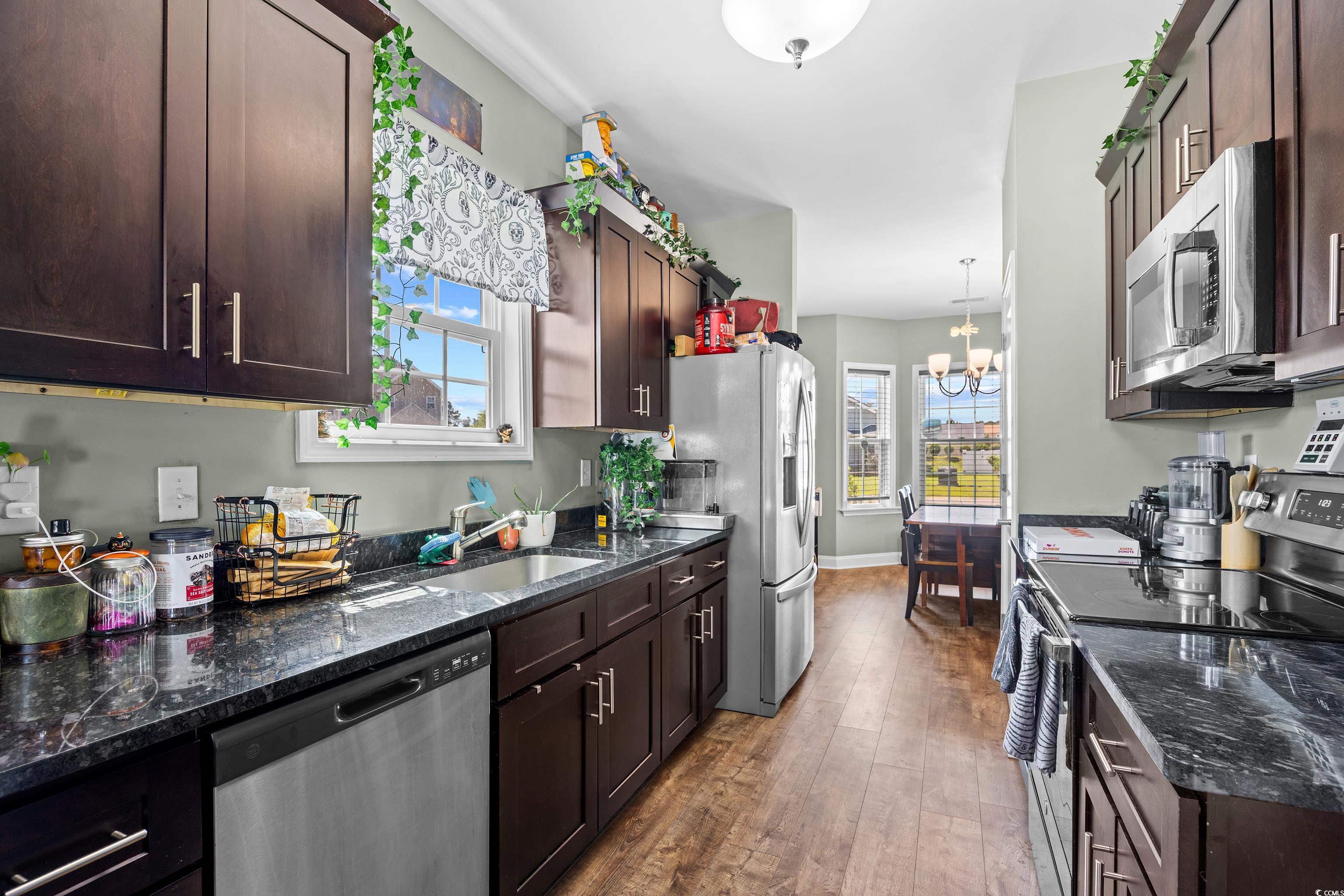 704 Hobonny Loop Longs, SC 29568 - Photo 12 of 36 Kitchen featuring stainless steel appliances, a ch